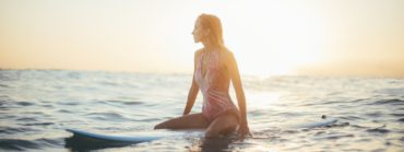 Woman surfer in Bali Kuta